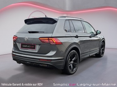 Volkswagen tiguan 2.0 tdi 150 cv dsg7 black r-line occasion simplicicar lagny  simplicicar simplicibike france