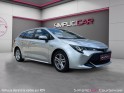 Toyota corolla touring sports hybride pro hybride 180h design garantie 12 mois occasion simplicicar courbevoie simplicicar...