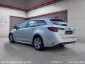 Toyota corolla touring sports hybride pro hybride 180h design garantie 12 mois occasion simplicicar courbevoie simplicicar...