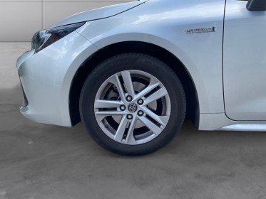 Toyota corolla touring sports hybride pro hybride 180h design garantie 12 mois occasion simplicicar courbevoie simplicicar...