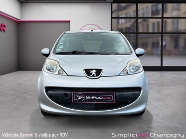 Peugeot 107 1.0e 12v 68ch trendy - climatisation - prise aux - radio cd - vitres électriques - 2 places occasion...