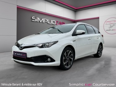 Toyota auris touring sports pro rc18 hybride pro 136h design - garantie 12 mois occasion simplicicar courbevoie simplicicar...