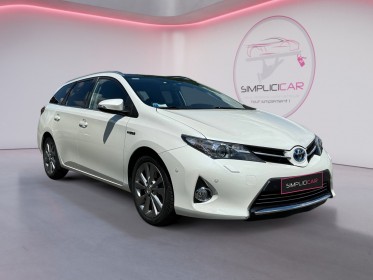 Toyota auris touring sports hybride 136h dynamic/toit panoramique/sieges chauffants occasion simplicicar orgeval  simplicicar...