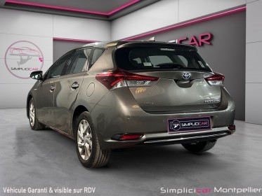 Toyota auris hybride 136h dynamic occasion montpellier (34) simplicicar simplicibike france