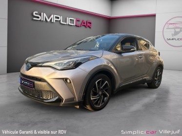 Toyota c-hr hybride mc19 2.0l graphic, garantie 12 mois,  enceinte jbl, angle mort. park assits, camera de recul occasion...