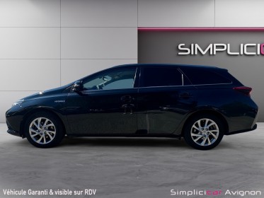 Toyota auris touring sports hybride 136h dynamic occasion avignon (84) simplicicar simplicibike france