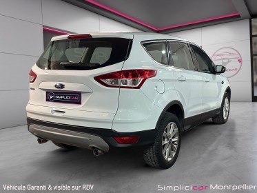 Ford kuga 2.0 tdci 120 ss 4x2 titanium gps radar ar clim bizone occasion montpellier (34) simplicicar simplicibike france