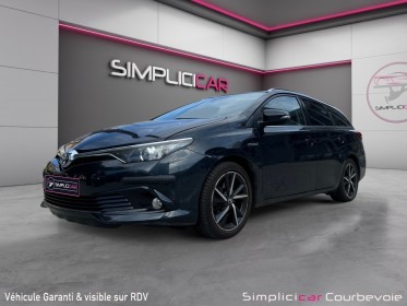 Toyota auris touring sports pro my17 hybride pro 136h design - garantie 12 mois occasion simplicicar courbevoie simplicicar...