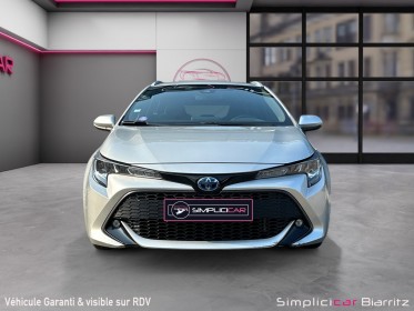 Toyota corolla touring sports hybride pro my20 pro hybride 122h dynamic business occasion simplicicar biarritz  simplicicar...