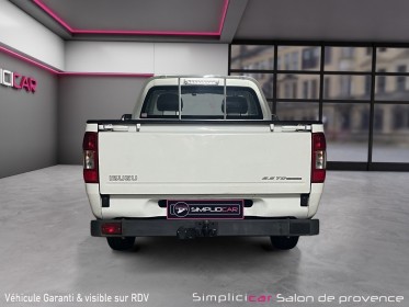 Isuzu d-max 2.5 2wd single cab/carplay/attelage/benne peinture raptor occasion simplicicar salon de provence simplicicar...