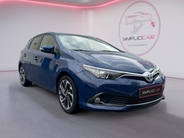 Toyota auris hybride 136h design business/gps/camera de recul/entretien toyota occasion simplicicar orgeval  simplicicar...