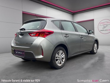 Toyota auris hybride 136h dynamic garantie 12 mois occasion simplicicar caen  simplicicar simplicibike france