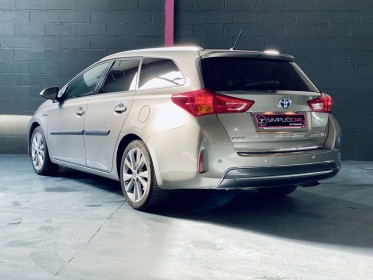 Toyota auris touring sports hybride 136h style- entretien toyota complet occasion simplicicar st-maximin simplicicar...