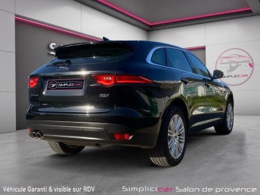 Jaguar f-pace 2.0 d - 180 ch awd bva8 portfolio / toit ouvrant / sieges chauffants electriques / camera 360 / son meridian...