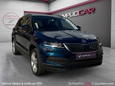 Skoda karoq 1.6 tdi 116 ch dsg7 style - entretien skoda - garantie 12 mois occasion simplicicar courbevoie simplicicar...