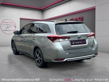 Toyota auris touring sports rc18 hybride 136h collection occasion simplicicar lagny  simplicicar simplicibike france