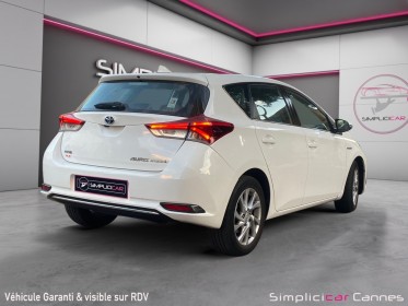 Toyota auris hybride 136h design occasion cannes (06) simplicicar simplicibike france