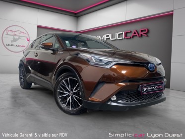 Toyota c-hr hybride 122h distinctive - garantie 12 mois occasion simplicicar lyon ouest simplicicar simplicibike france