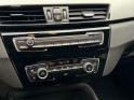 Bmw x1 f48 lci sdrive 18i 140 ch dkg7 business design / garantie 12 mois / entretiens bmw occasion paris 17ème (75)(porte...