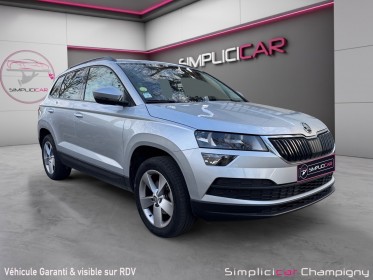 Skoda karoq 1.6 tdi 116 ch dsg7 business - caméra de recul - démarrage sans clé - pack climatisation avec air care...