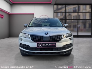 Skoda karoq 1.6 tdi 116 ch dsg7 business - caméra de recul - démarrage sans clé - pack climatisation avec air care...