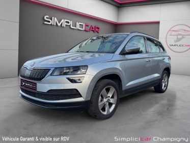 Skoda karoq 1.6 tdi 116 ch dsg7 business - caméra de recul - démarrage sans clé - pack climatisation avec air care...