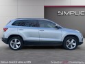 Skoda karoq 1.6 tdi 116 ch dsg7 business - caméra de recul - démarrage sans clé - pack climatisation avec air care...