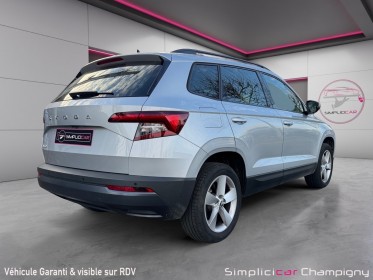 Skoda karoq 1.6 tdi 116 ch dsg7 business - caméra de recul - démarrage sans clé - pack climatisation avec air care...