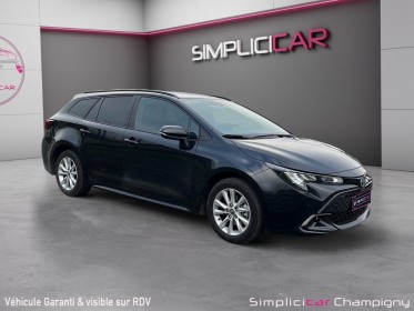 Toyota corolla touring sports hybride pro nouve pro hybride 140ch dynamic business  programme beyond zero academy occasion...