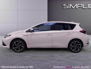 Toyota auris hybride 136h design garantie 12 mois occasion simplicicar lyon ouest simplicicar simplicibike france