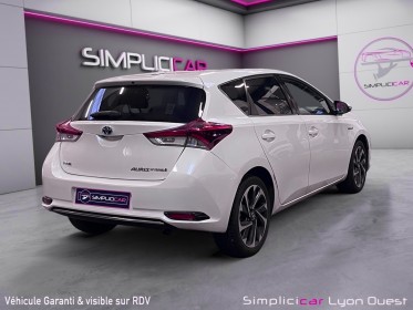 Toyota auris hybride 136h design garantie 12 mois occasion simplicicar lyon ouest simplicicar simplicibike france