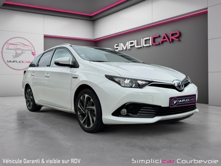 Toyota auris touring sports pro rc18 hybride pro 136h design - garantie 12 mois occasion simplicicar courbevoie simplicicar...