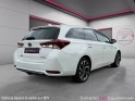 Toyota auris touring sports pro rc18 hybride pro 136h design - garantie 12 mois occasion simplicicar courbevoie simplicicar...