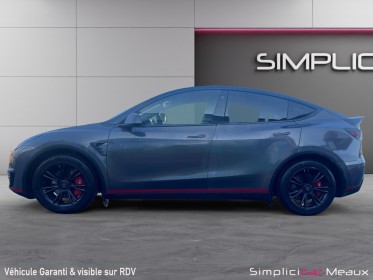 Tesla model y standard rwd long rang covering cameleon occasion simplicicar meaux simplicicar simplicibike france