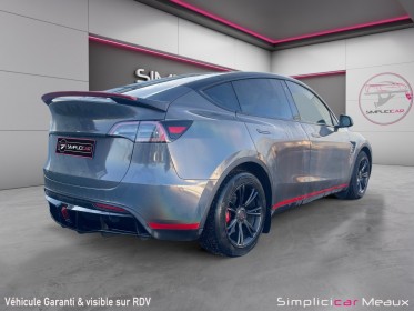 Tesla model y standard rwd long rang covering cameleon occasion simplicicar meaux simplicicar simplicibike france