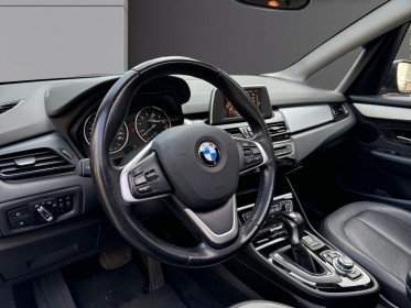 Bmw serie 2 active tourer f45 218i 136 ch toit ouvrant/entretien complet bmw/garantie 12 mois occasion paris 17ème...