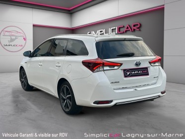 Toyota auris touring sports pro my17 hybride   pro 136h design occasion simplicicar lagny  simplicicar simplicibike france