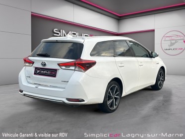 Toyota auris touring sports pro my17 hybride   pro 136h design occasion simplicicar lagny  simplicicar simplicibike france