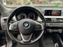 Bmw x1 f48 lci sdrive 18i 140 ch dkg7 business design / garantie 12 mois / entretiens bmw occasion paris 17ème (75)(porte...