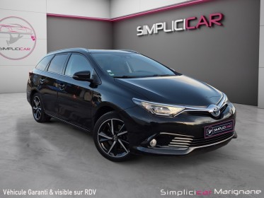 Toyota auris touring sports hybride 136h executive / sieges chauffants / camera recul / attelage amovible / garantie 12 mois...