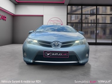 Toyota auris business hybride 136h business 15, garantie 12 mois, hybride occasion simplicicar villejuif  simplicicar...