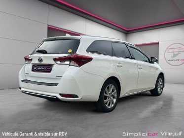 Toyota auris touring sports collection hybride 136h dynamic, garantie 12 mois, camera de recul, gps occasion simplicicar...