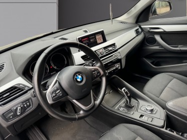 Bmw x1 f48 lci sdrive 18i 140 ch dkg7 business design / garantie 12 mois comstructeur / entretiens bmw occasion paris 17ème...