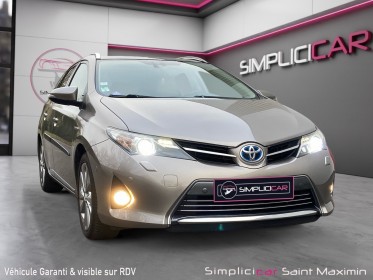 Toyota auris touring sports hybride 136h style- entretien toyota complet occasion simplicicar st-maximin simplicicar...