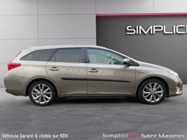 Toyota auris touring sports hybride 136h style- entretien toyota complet occasion simplicicar st-maximin simplicicar...