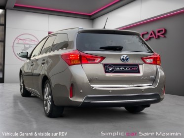 Toyota auris touring sports hybride 136h style- entretien toyota complet occasion simplicicar st-maximin simplicicar...