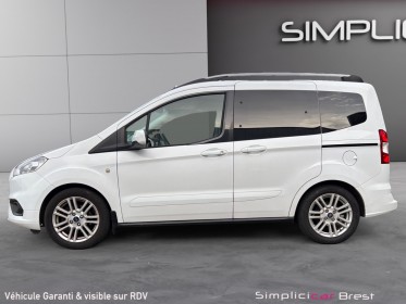 Ford tourneo courier 1.0 e 100 bv6 ss titanium-garantie 12 mois occasion simplicicar brest simplicicar simplicibike france