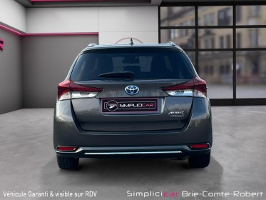 Toyota auris touring sports pro my17 hybride pro 136h design business occasion simplicicar brie-comte-robert simplicicar...