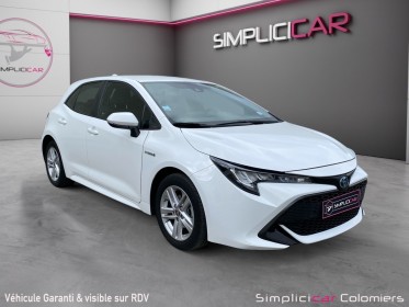 Toyota corolla hybride my21 122h dynamic / garantie 12 mois / camera / carplay occasion simplicicar colomiers  simplicicar...