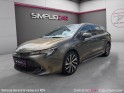 Toyota corolla touring sports hybride my21 122h design garantie 12 mois occasion paris 17ème (75)(porte maillot) simplicicar...